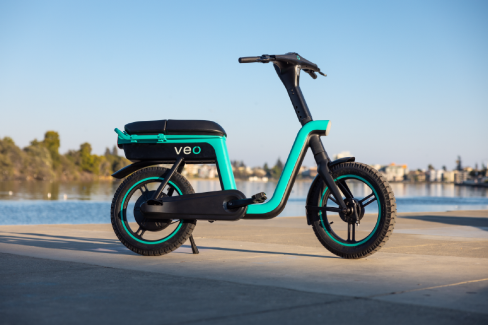 Electric bike with store passenger seat